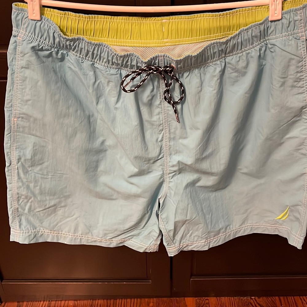 Nautica mens swim trunks with lining. Teal colour with white stitching. Size xxl